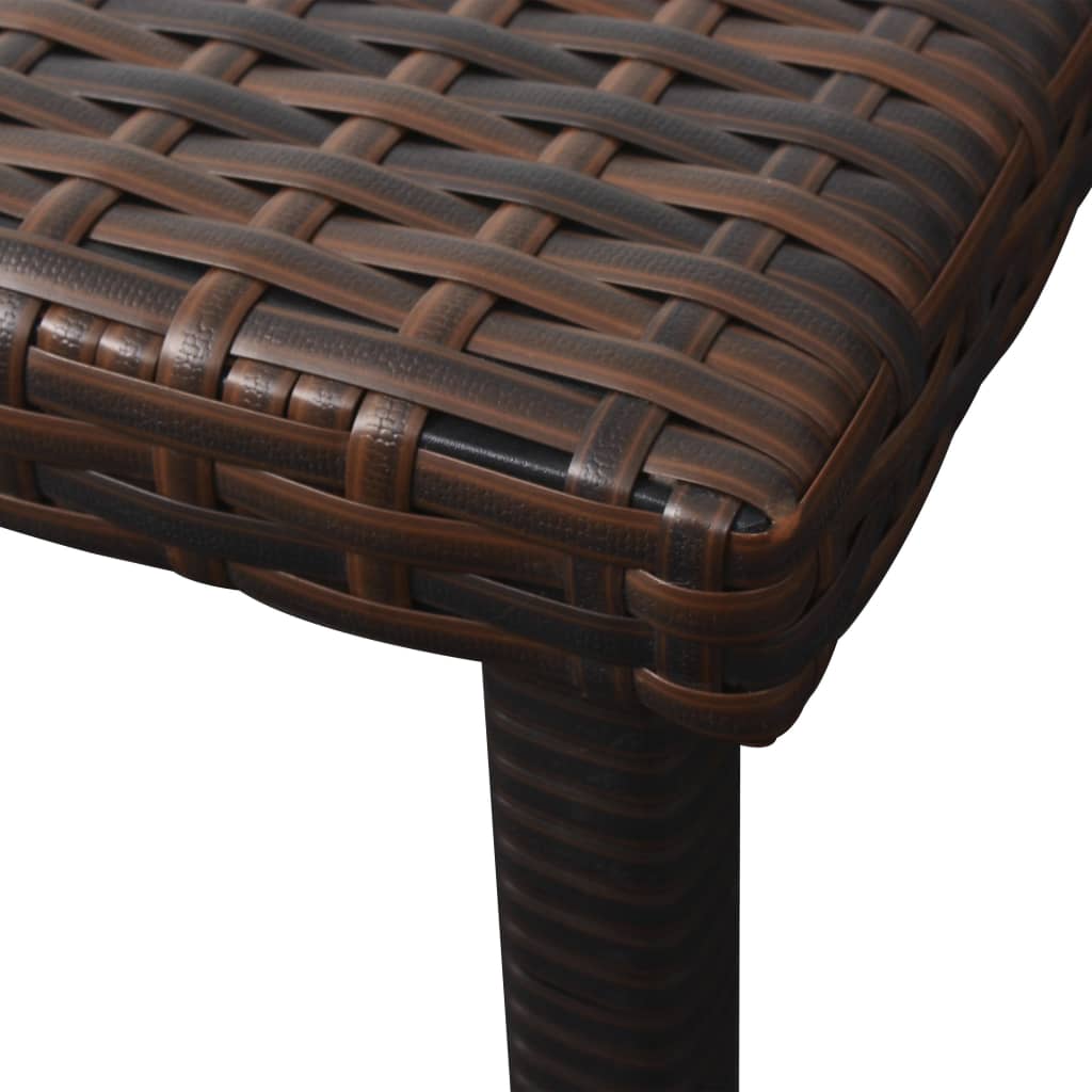 Long chair with cushion and brown braided resin table