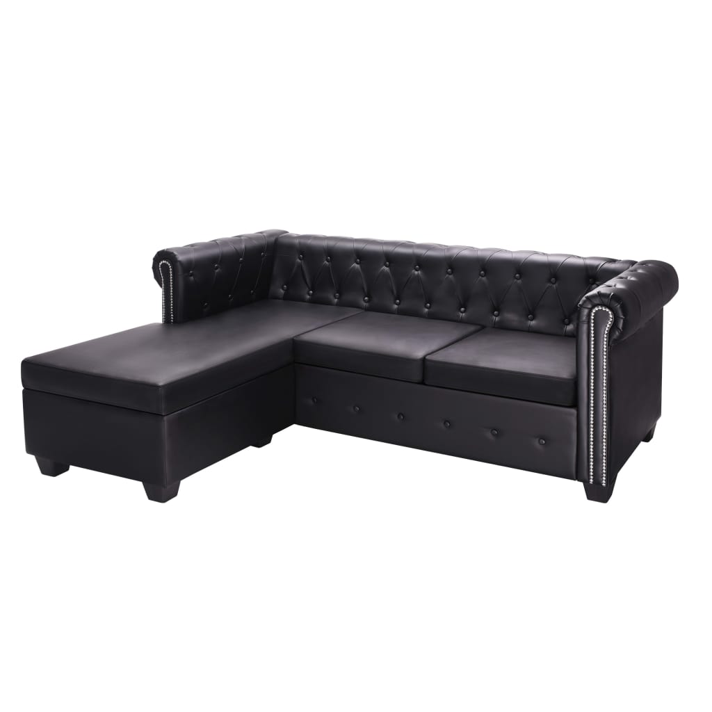 Chesterfield sofa in the shape of black synthetic leather
