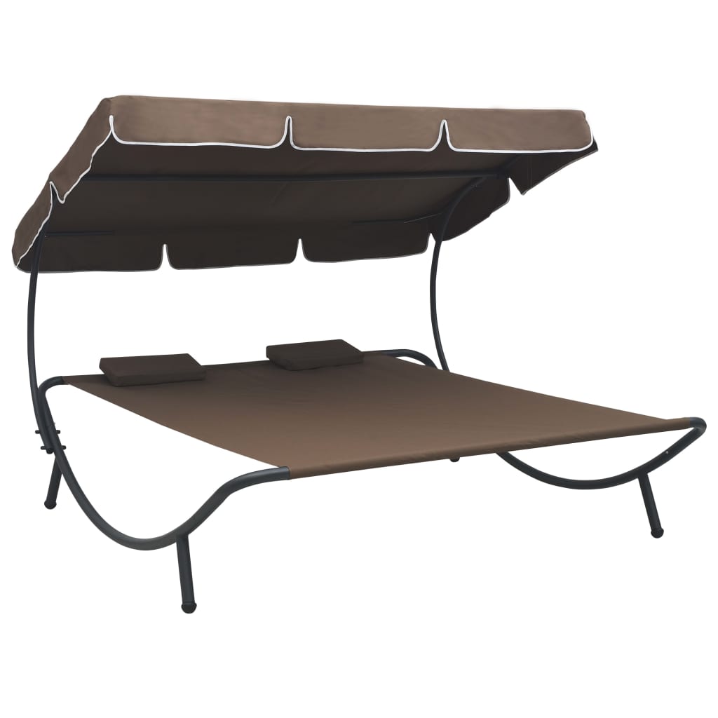 Outdoor rest bed with awning and brown pillows