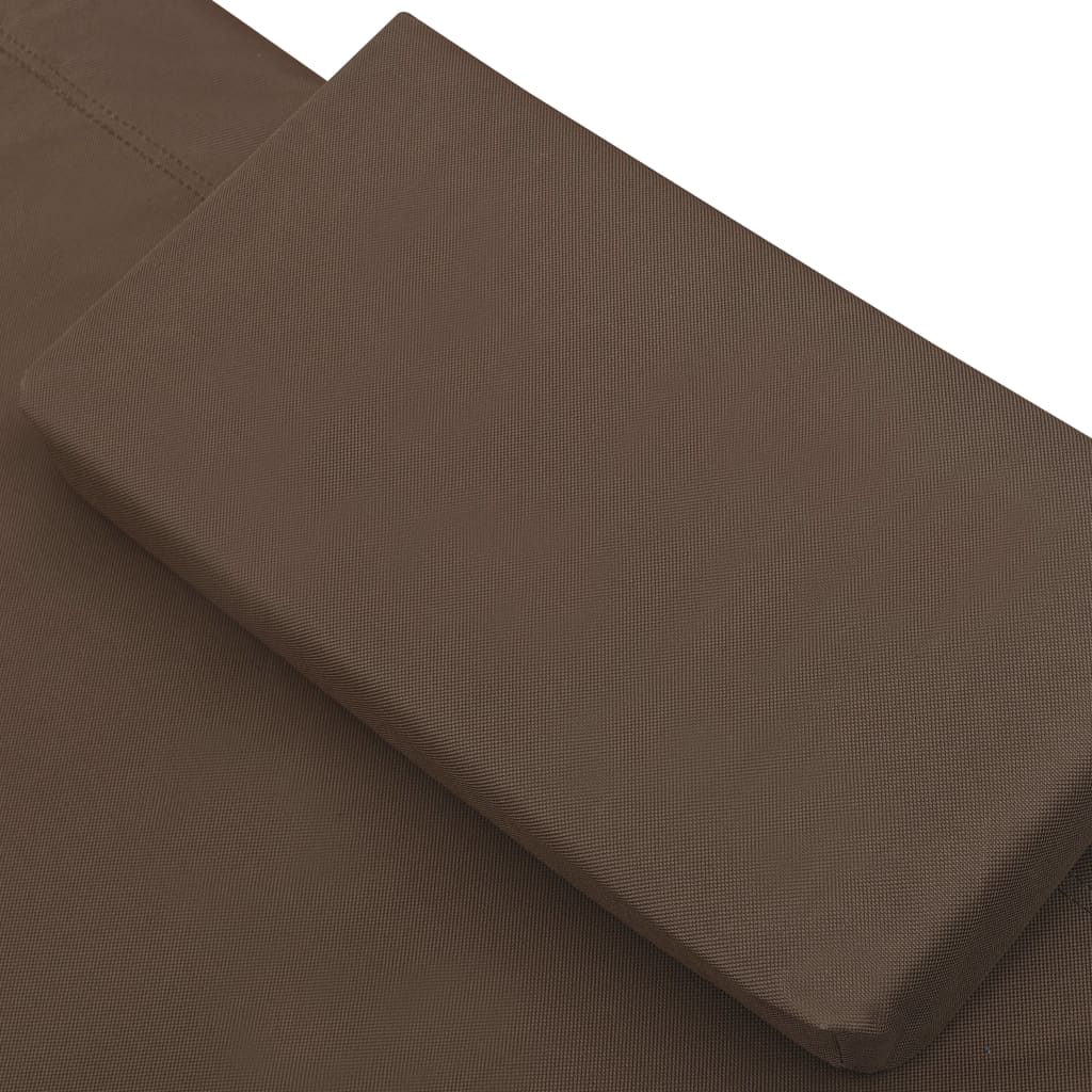 Outdoor rest bed with awning and brown pillow