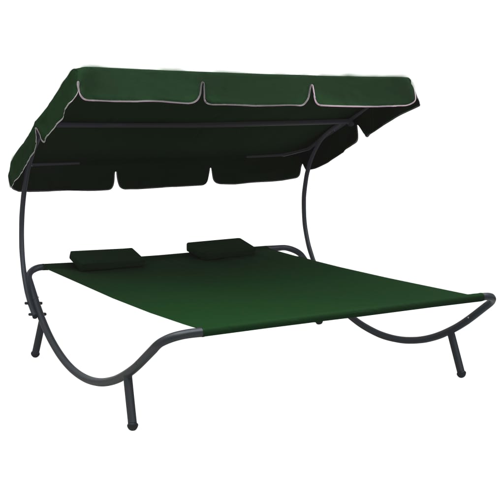 Outdoor rest bed with awning and green pillows