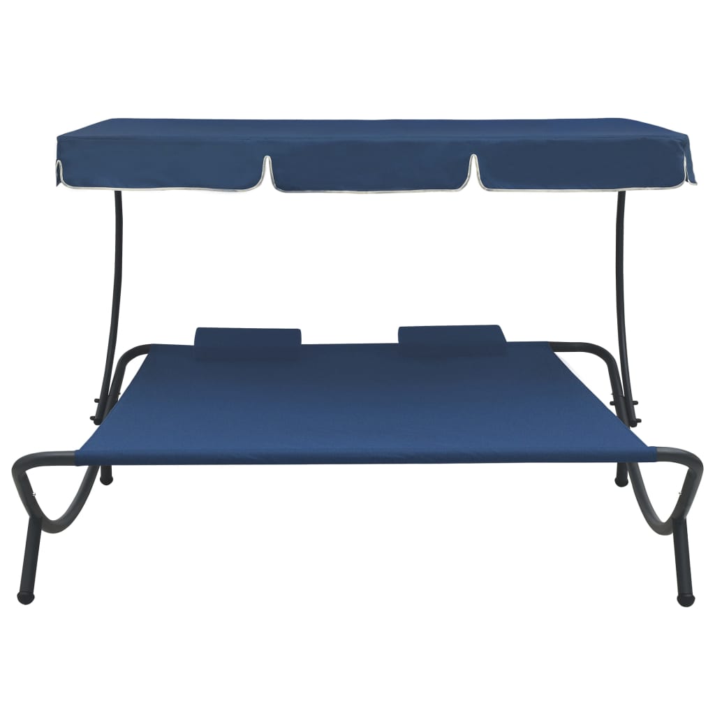 Outdoor rest bed with awning and blue pillows