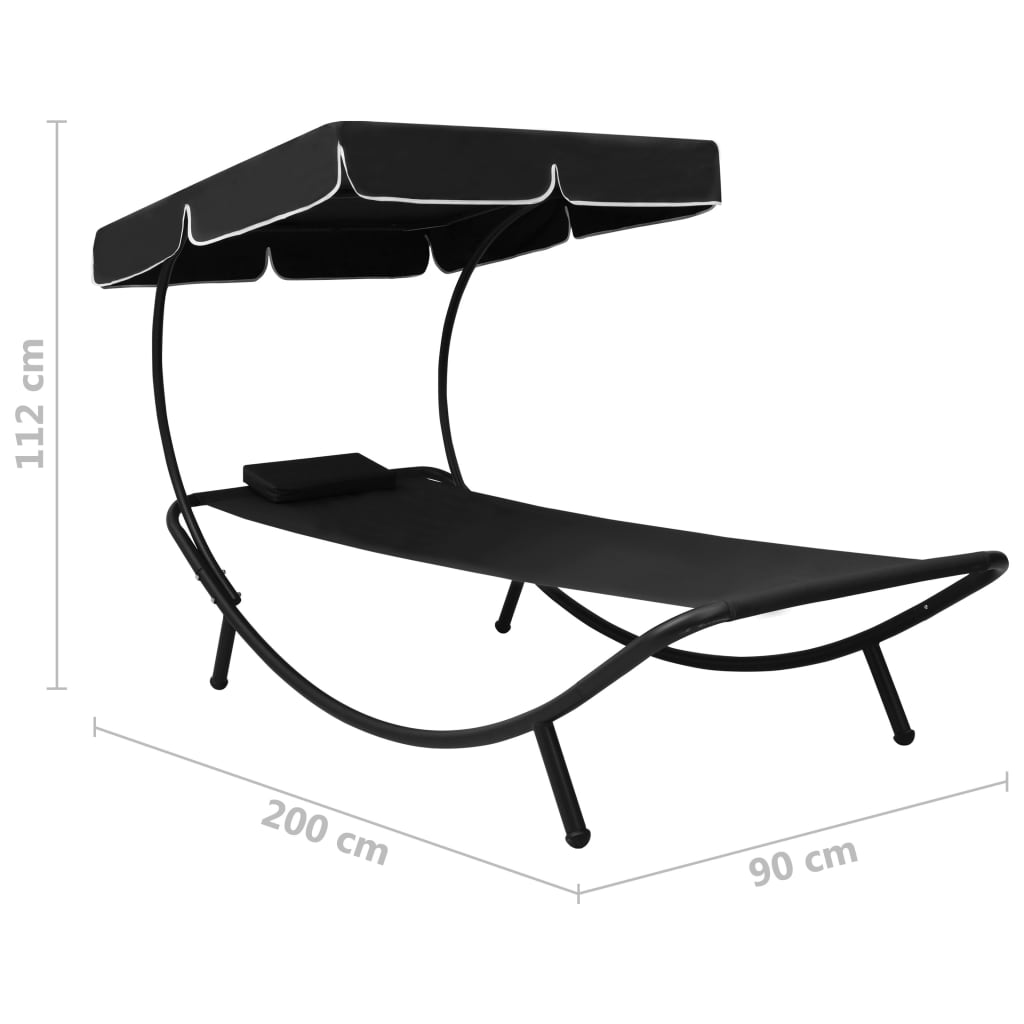 Outdoor rest bed with awning and black pillow