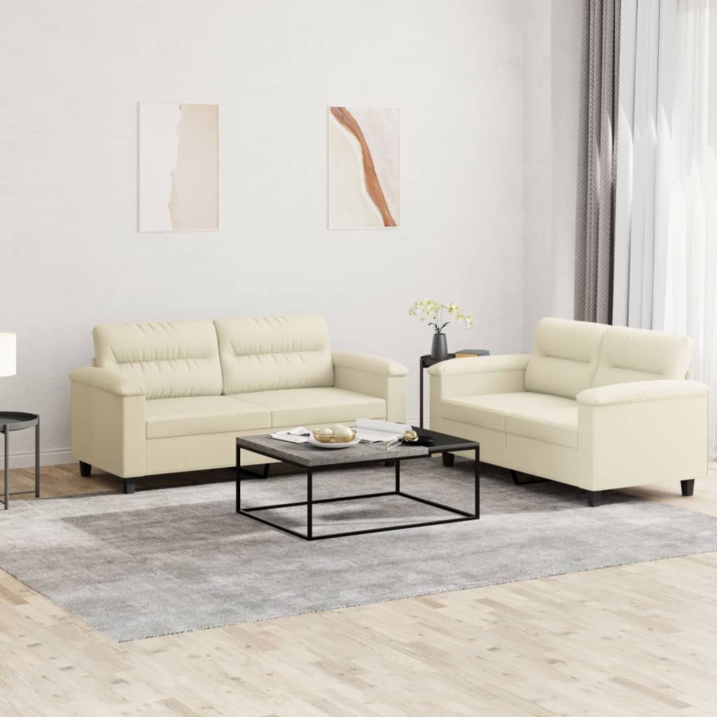 Set divano 2 pezzi con cuscini in ecopelle color crema